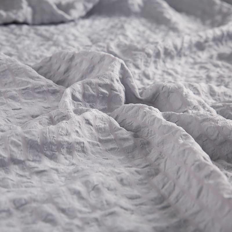 Venta al por mayor La textil para el hogar de seersucker de fibra química 100% poliéster es suave y agradable para la piel, fuerte y duradera, se pueden teñir varios colores
